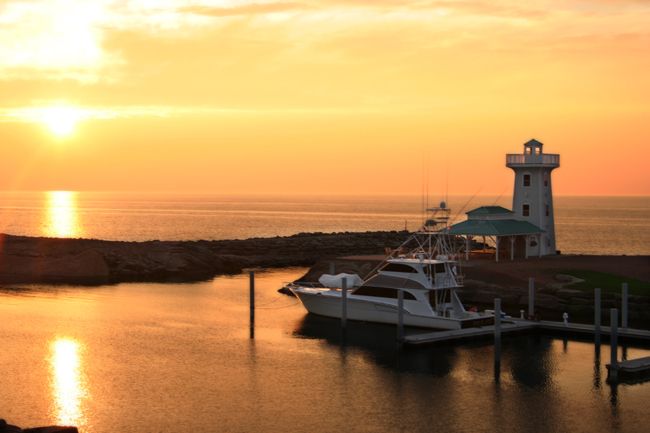 Fox Harb'r Resort lighthouse at sunset.